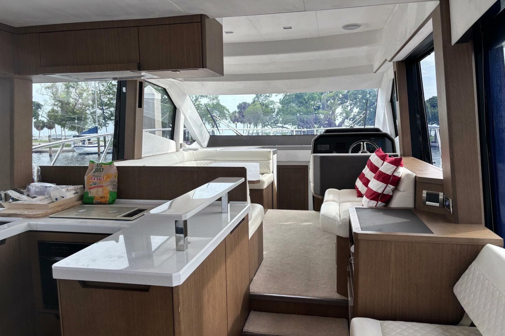 Interior of 2020 Galeon 500 Fly yacht with modern kitchen and seating area.