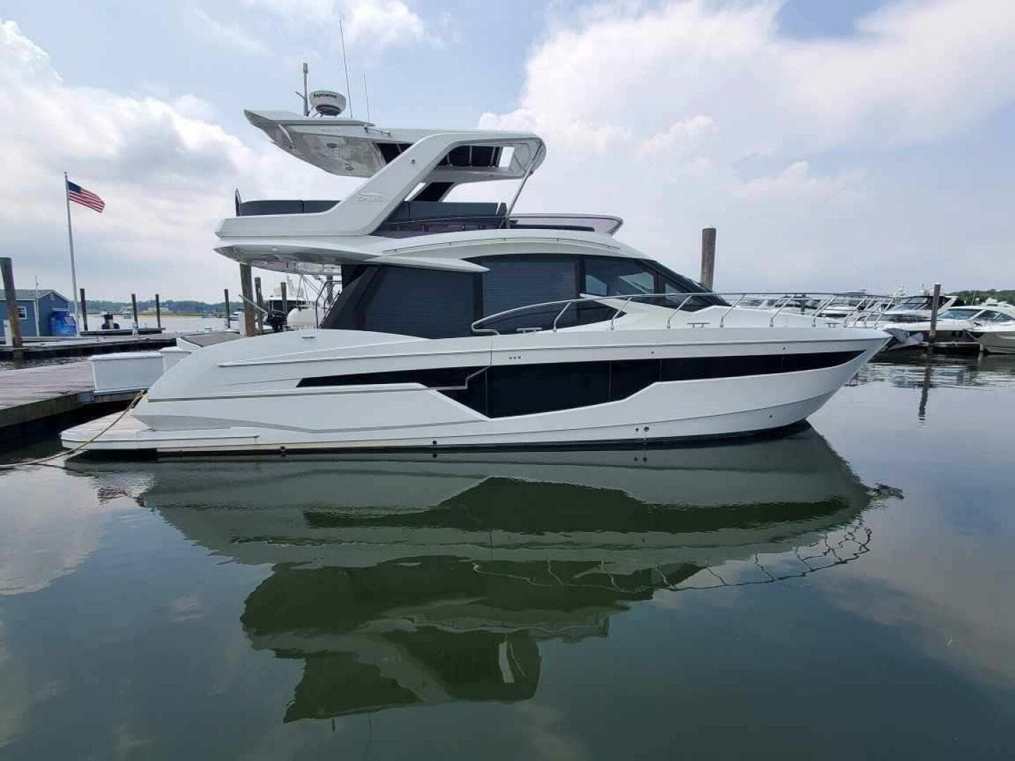 2020 Galeon 500 Fly yacht docked at a marina.