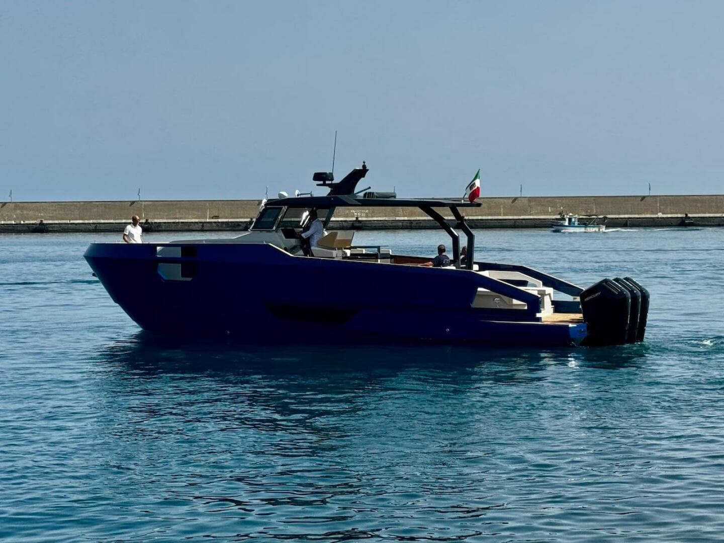 2025 Aicon Audace 50 yacht on calm water, side view.