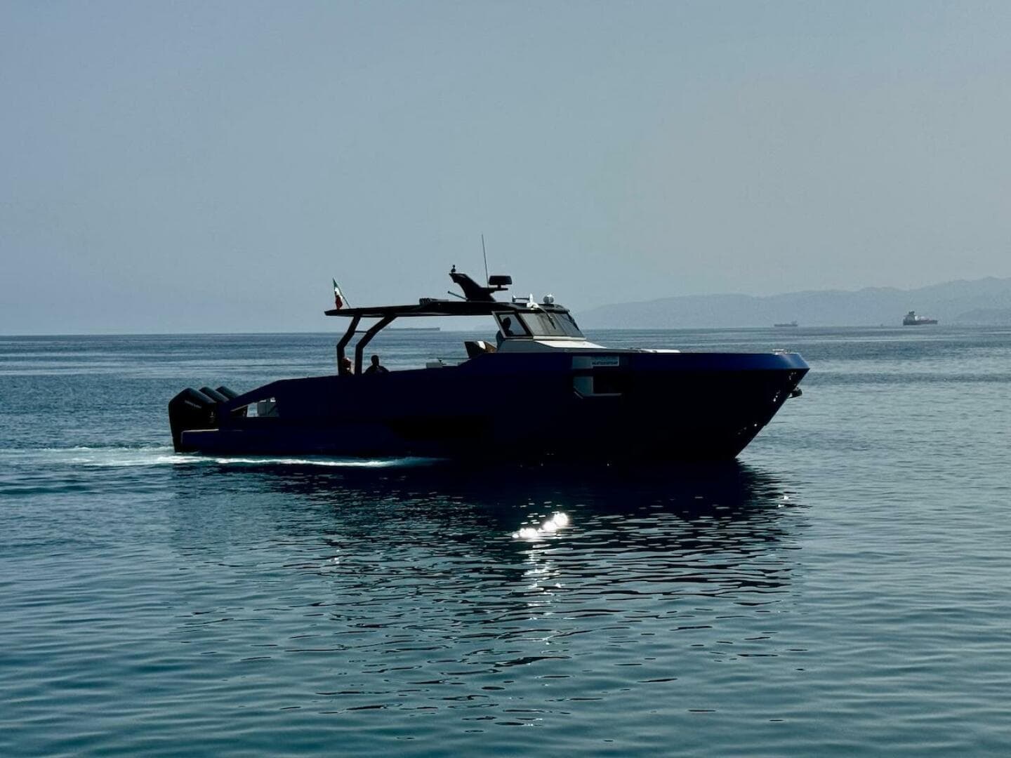 2025 Aicon Audace 50 yacht cruising on calm sea waters.