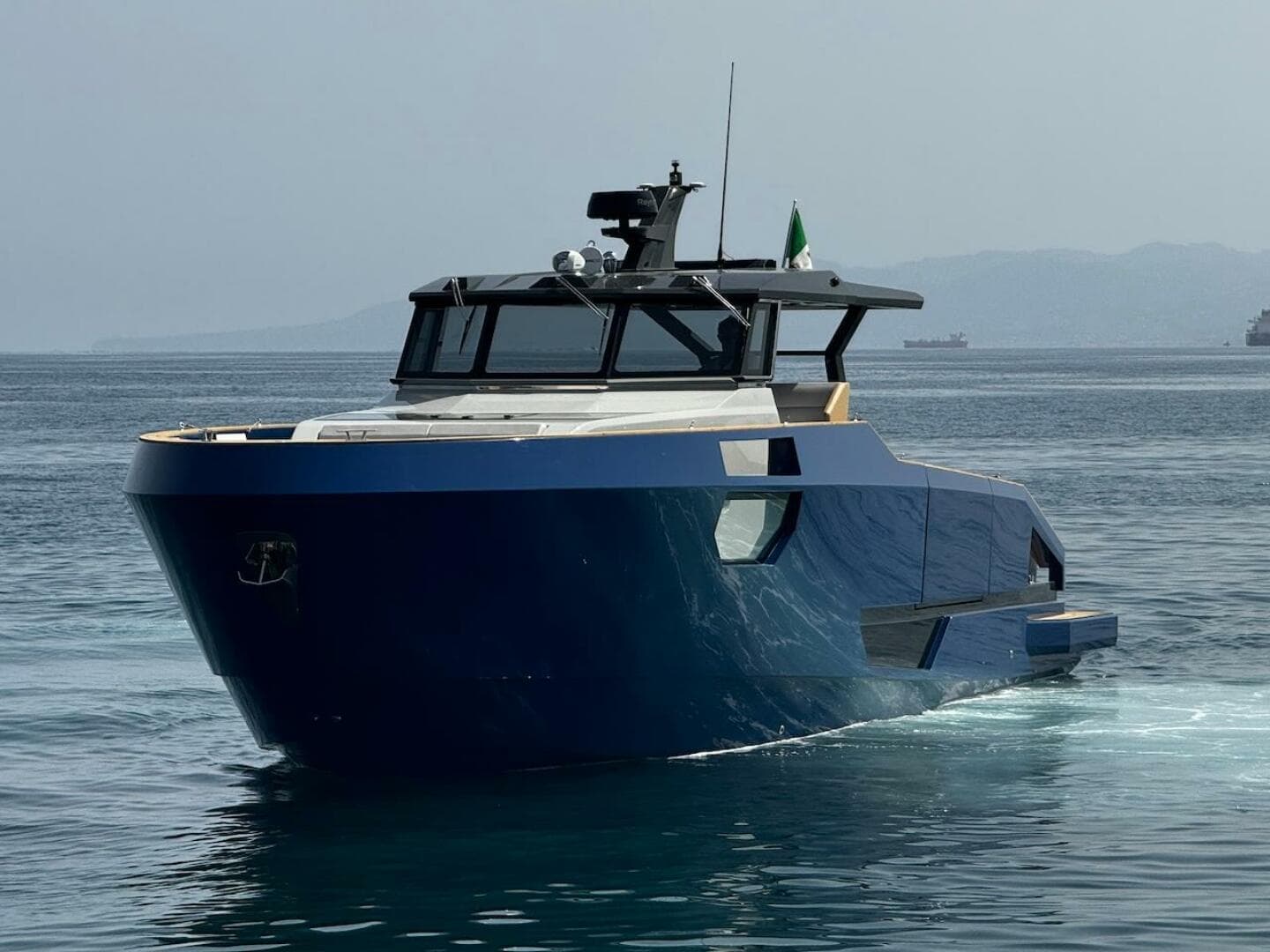 2025 Aicon Audace 50 yacht cruising on calm waters.