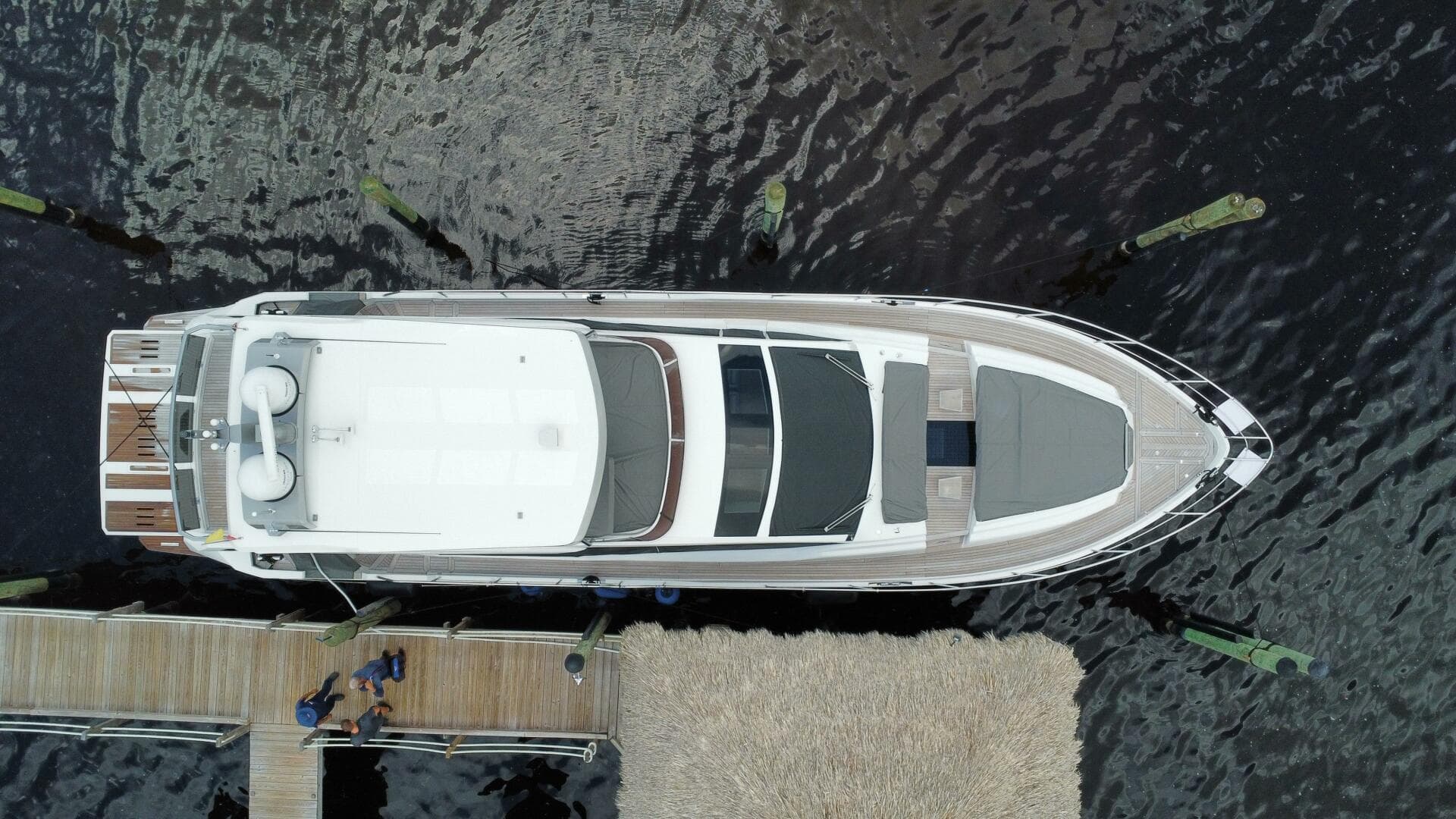 Aerial view of 2024 Aicon 66 Vivere luxury yacht docked at a marina.