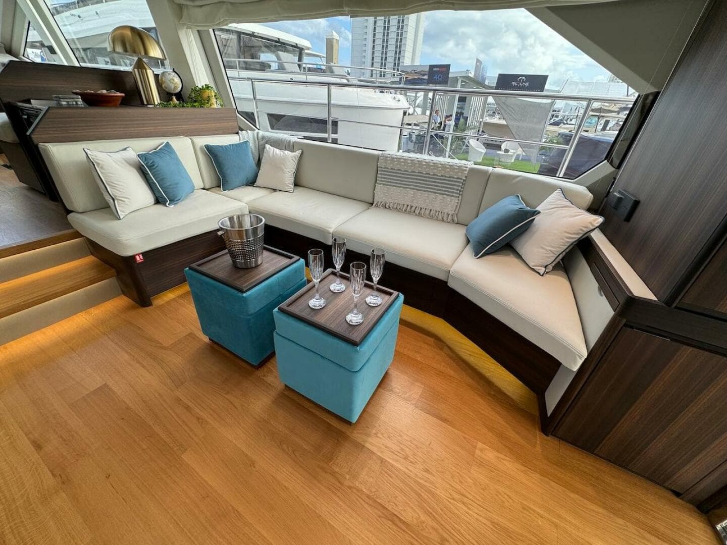 Luxurious interior of 2024 Aicon 66 Vivere yacht with elegant seating and decor.