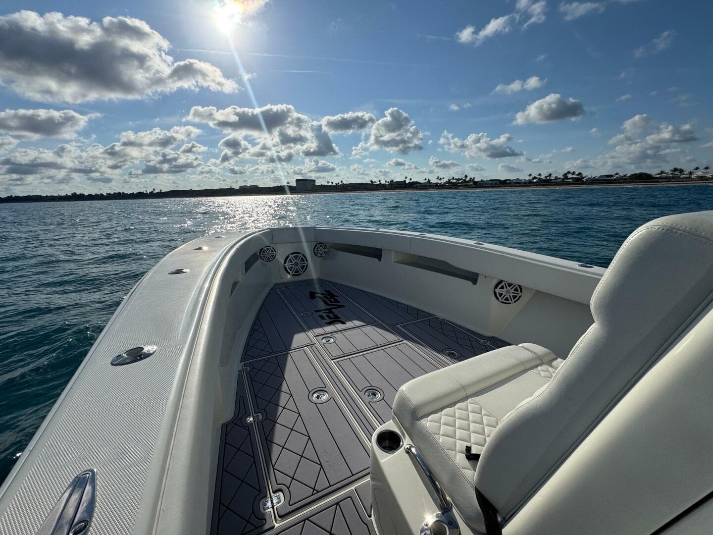 2017 SeaVee 340Z boat on water, sunny day, clear skies, and calm sea.
