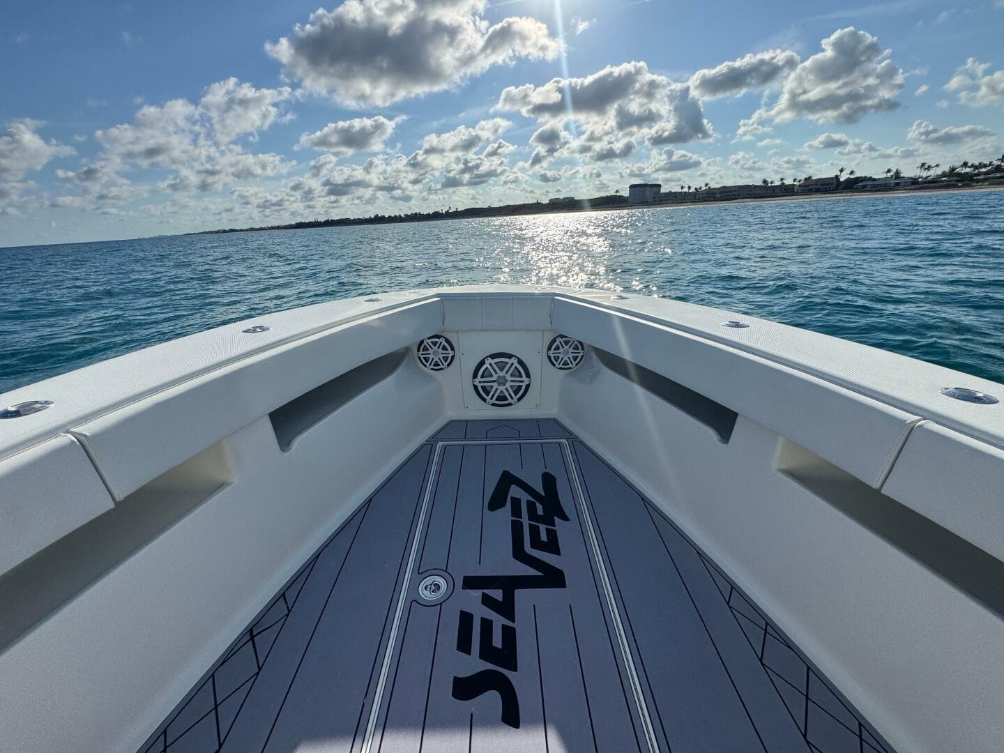 2017 SeaVee 340Z boat on ocean, sunny day, clear sky, calm waters.
