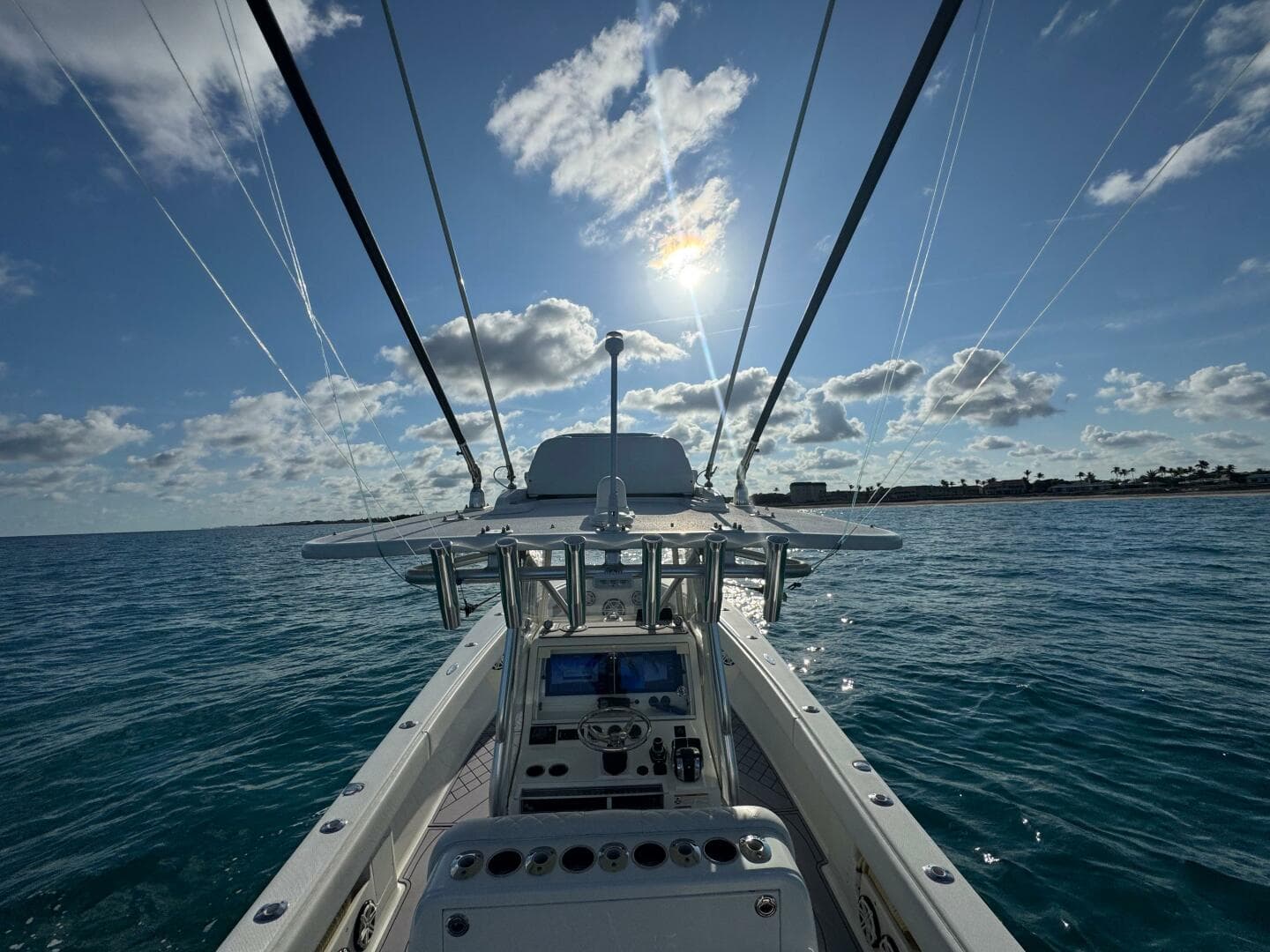2017 SeaVee 340Z boat on open water under a bright, sunny sky.