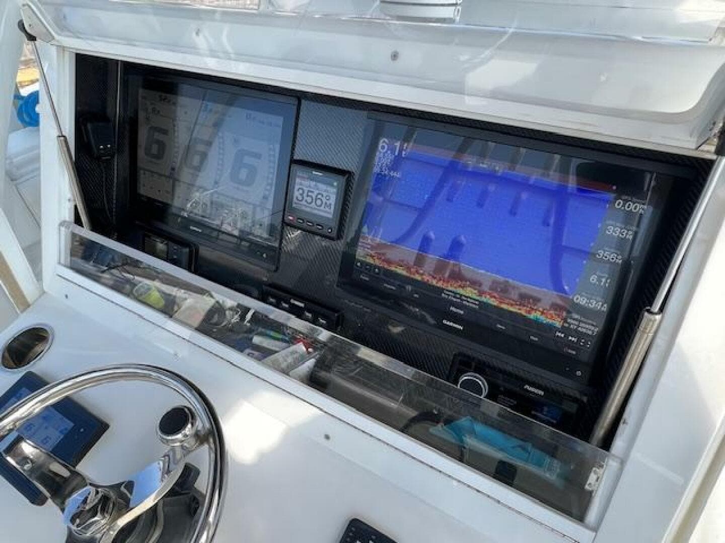 Control panel of 2020 SeaHunter 39 Tournament boat with advanced navigation displays.