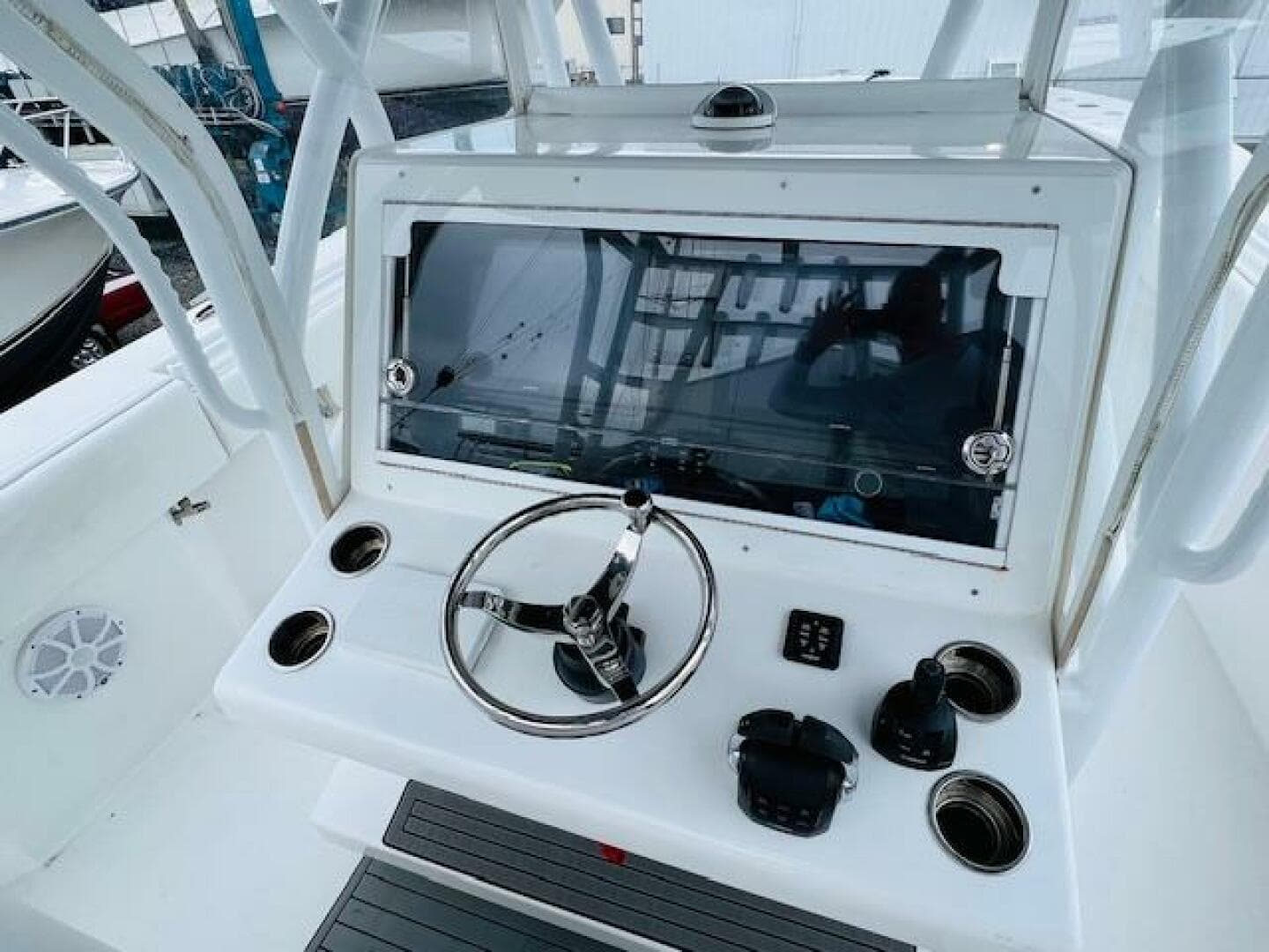 2020 SeaHunter 39 Tournament boat helm with steering wheel and control panel.
