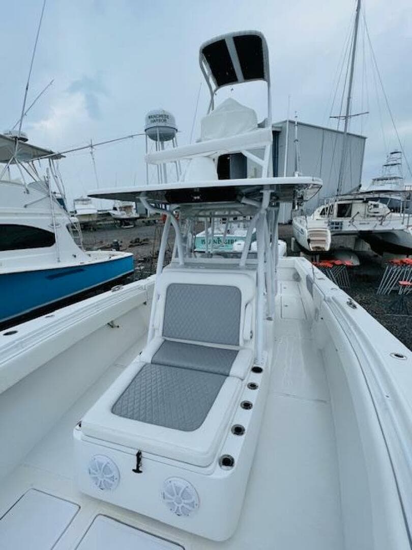 2020 SeaHunter 39 Tournament boat with elevated helm, docked in a marina.