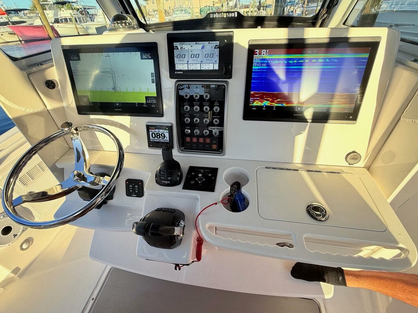 2014 Everglades 355 Center Console dashboard with navigation screens and controls.
