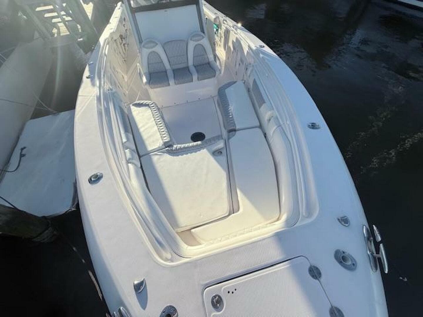 2014 Everglades 355 Center Console boat with spacious seating and sleek design.