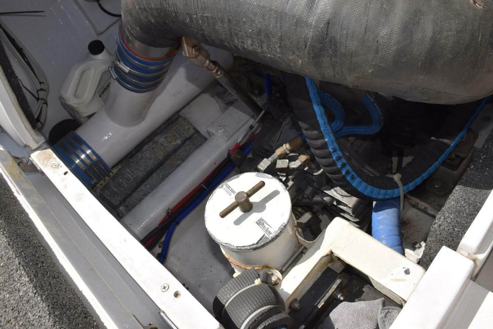 Port Side Motor Aft, Racor Filter, Fiberglass Surge Tubes
