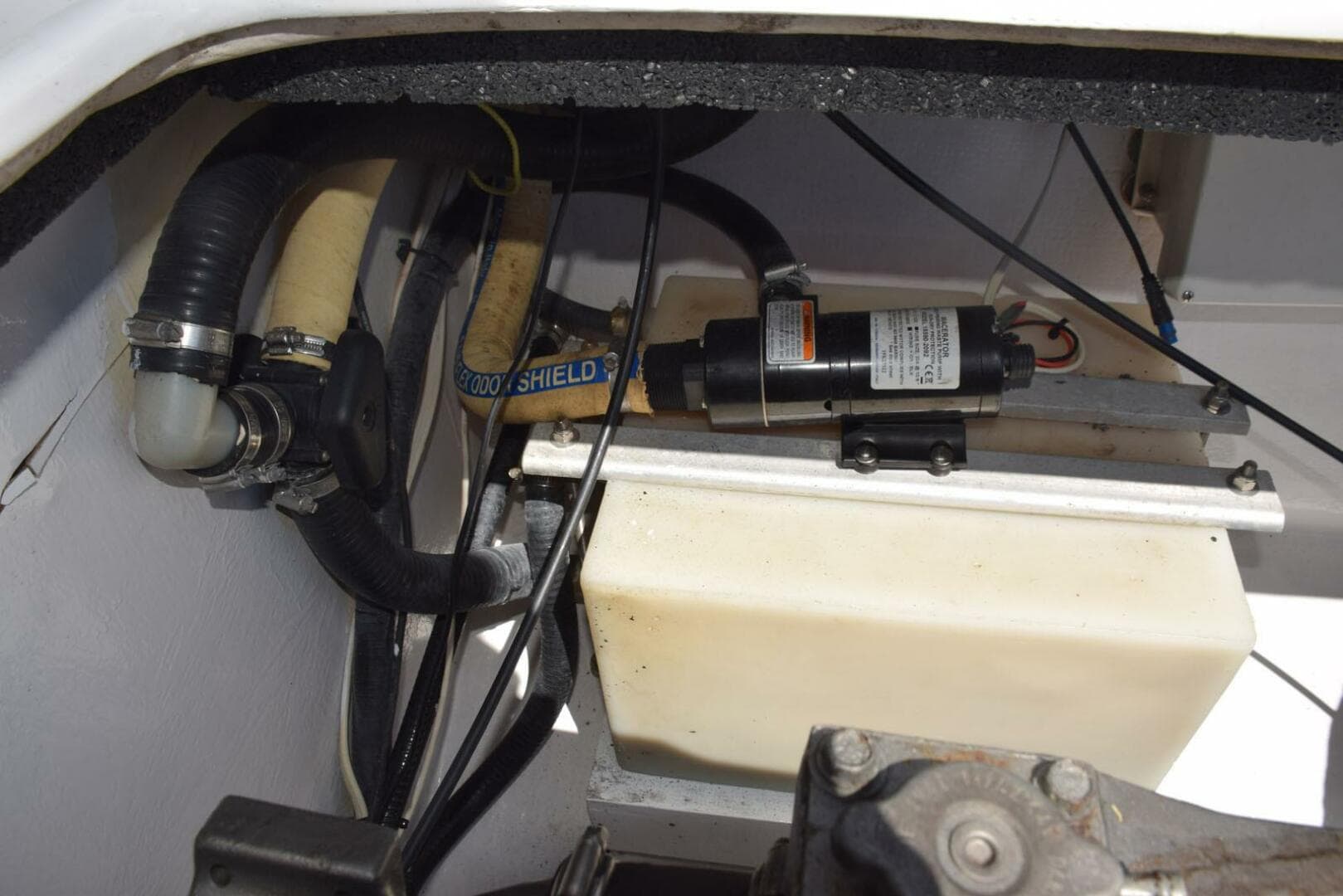 Holding Tank Outboard Of Starboard Motor