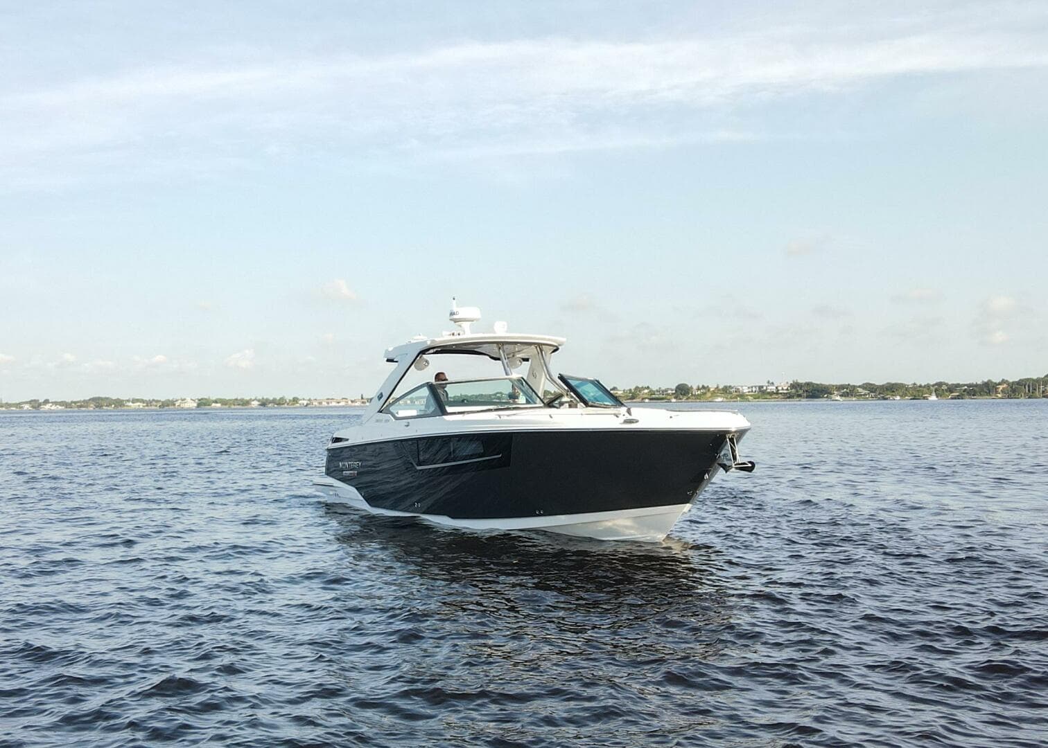 2023 Monterey 385 Super Sport boat cruising on open water.