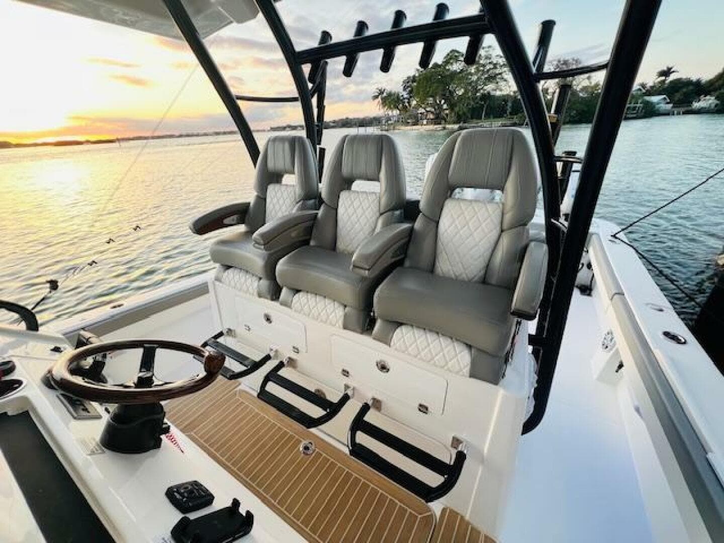 2024 Regulator 41 boat interior with luxury seating at sunset on the water.