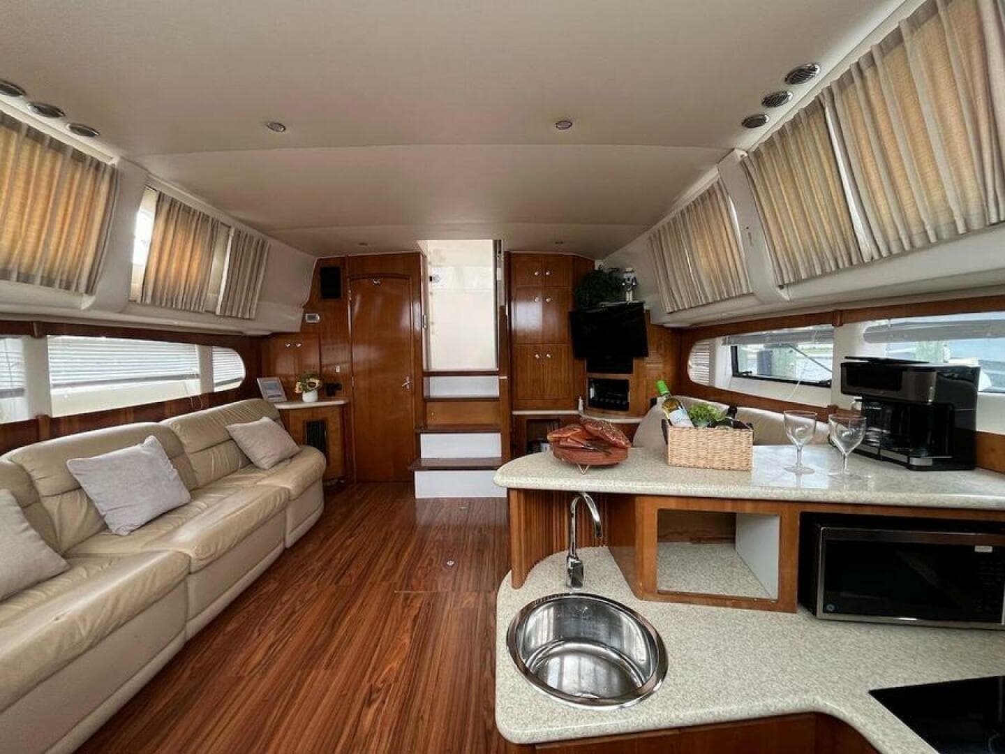 Luxurious interior of a 2000 Carver 396 Motor Yacht with modern amenities and elegant design.