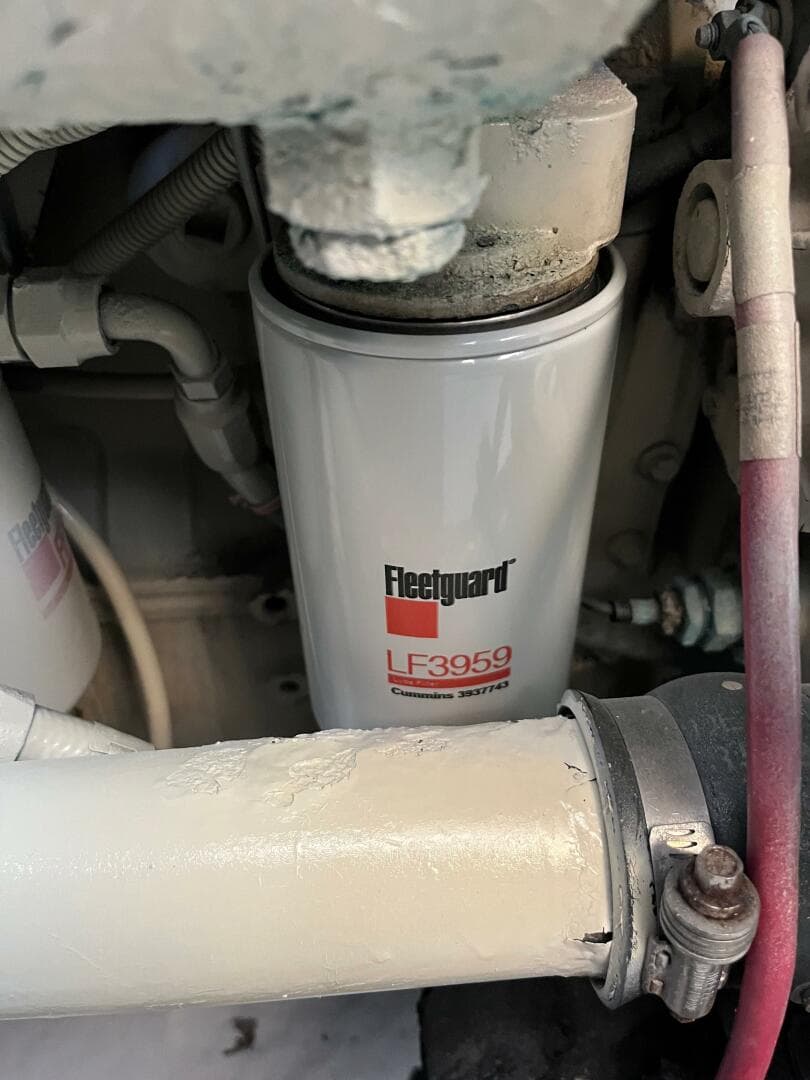 Fleetguard LF3959 filter in 2000 Carver 396 Motor Yacht engine compartment.