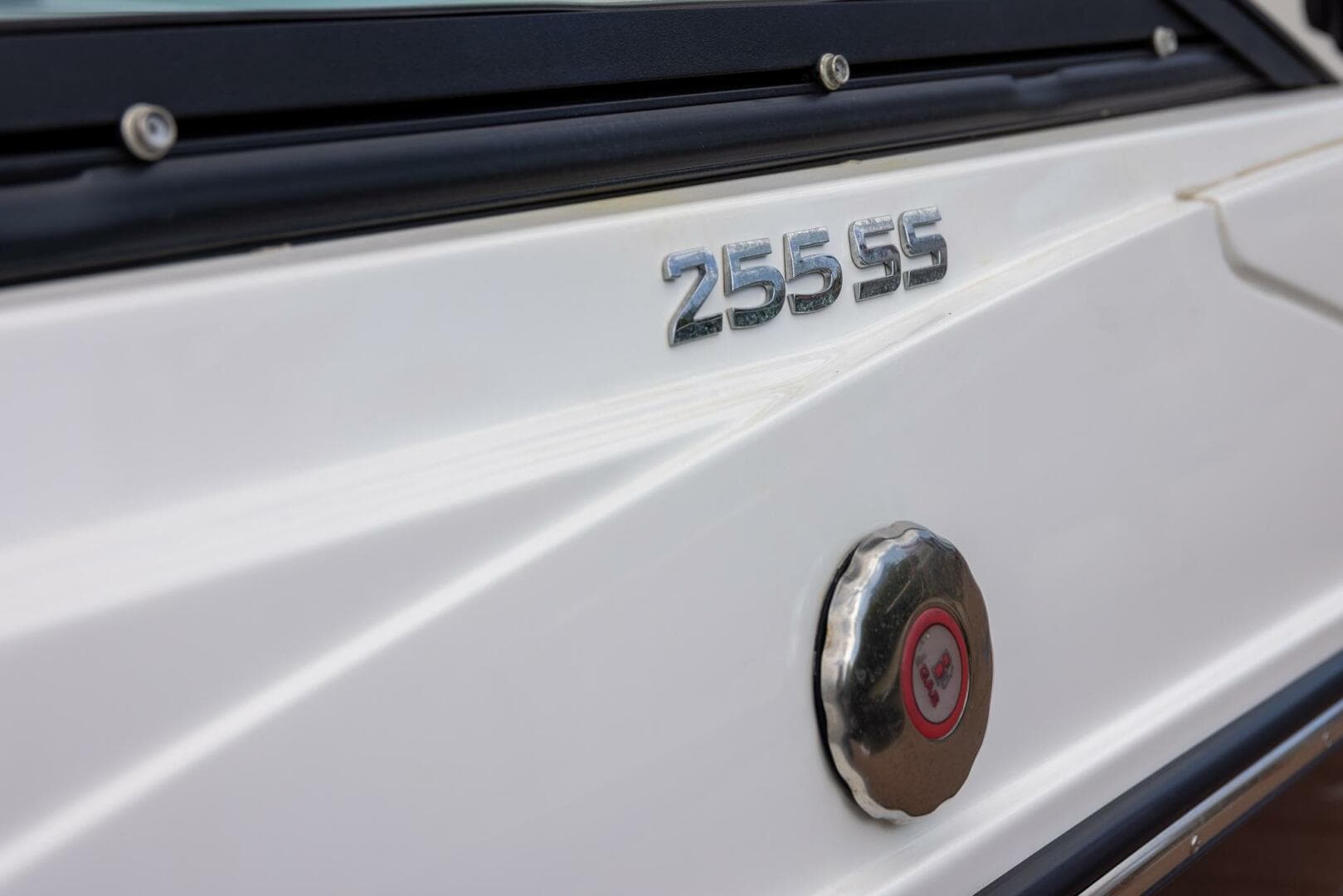 2023 Monterey 255 Super Sport boat exterior with model emblem and fuel cap.