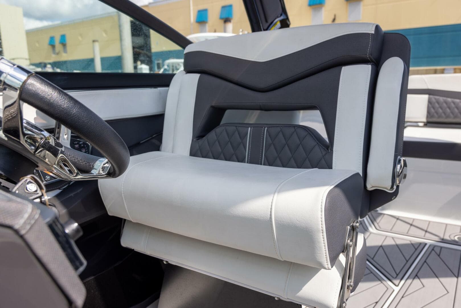 2023 Monterey 255 Super Sport boat interior with modern seating and steering wheel.