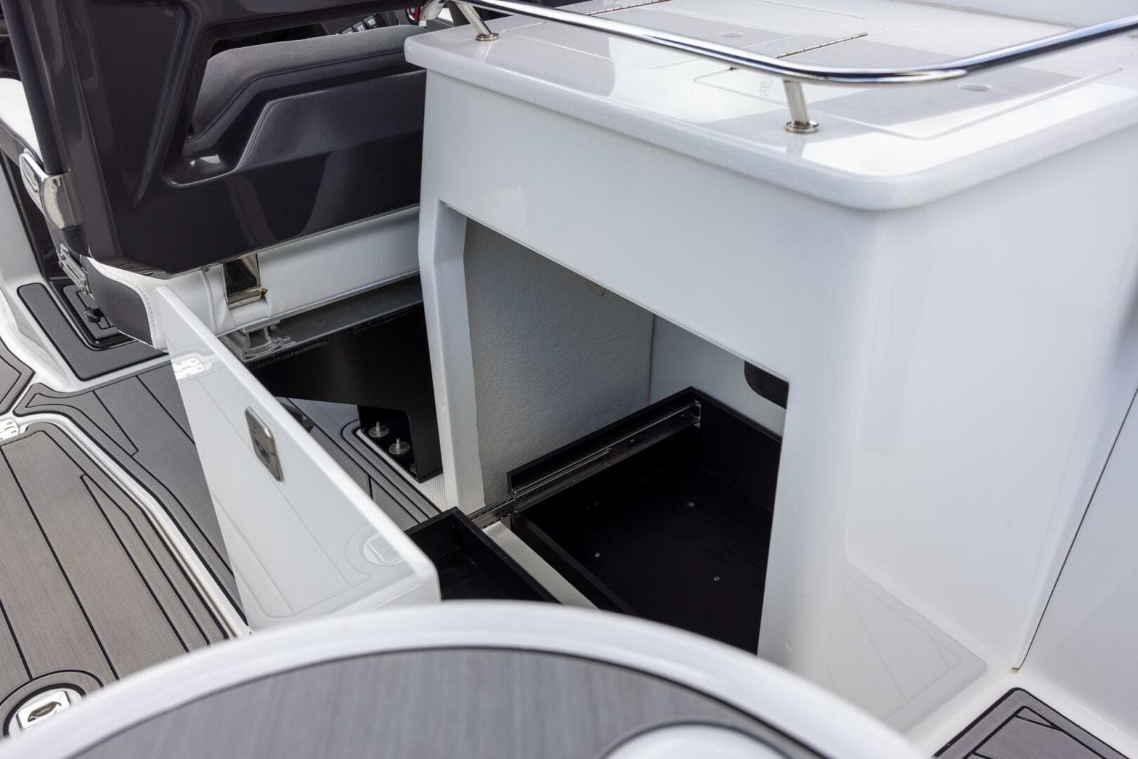 2023 Monterey 255 Super Sport boat interior storage compartments.