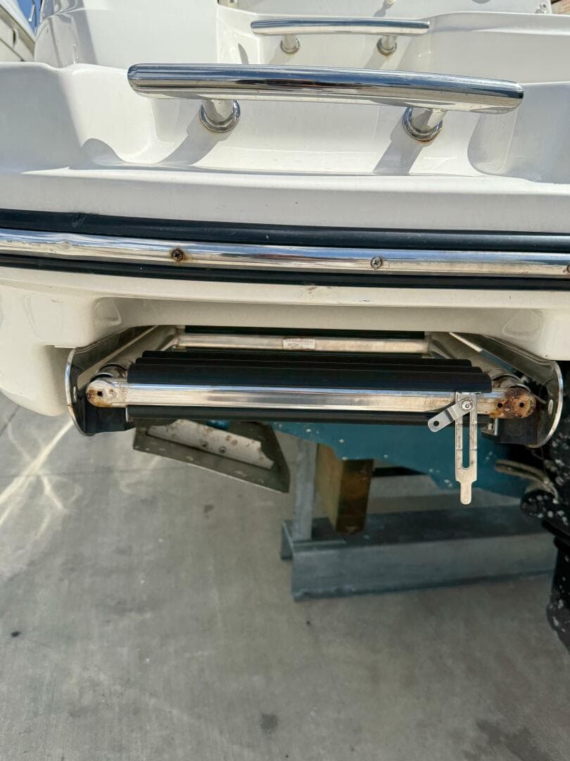 2014 Sea Ray 270 SLX boat with stainless steel swim platform ladder.