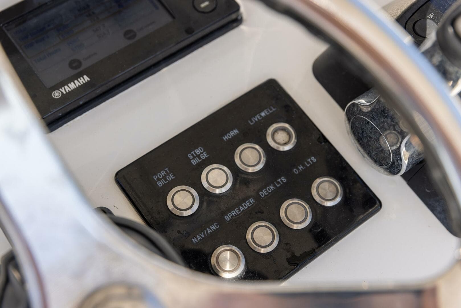 Control panel of a 2018 Jupiter 26 FS boat with Yamaha display.