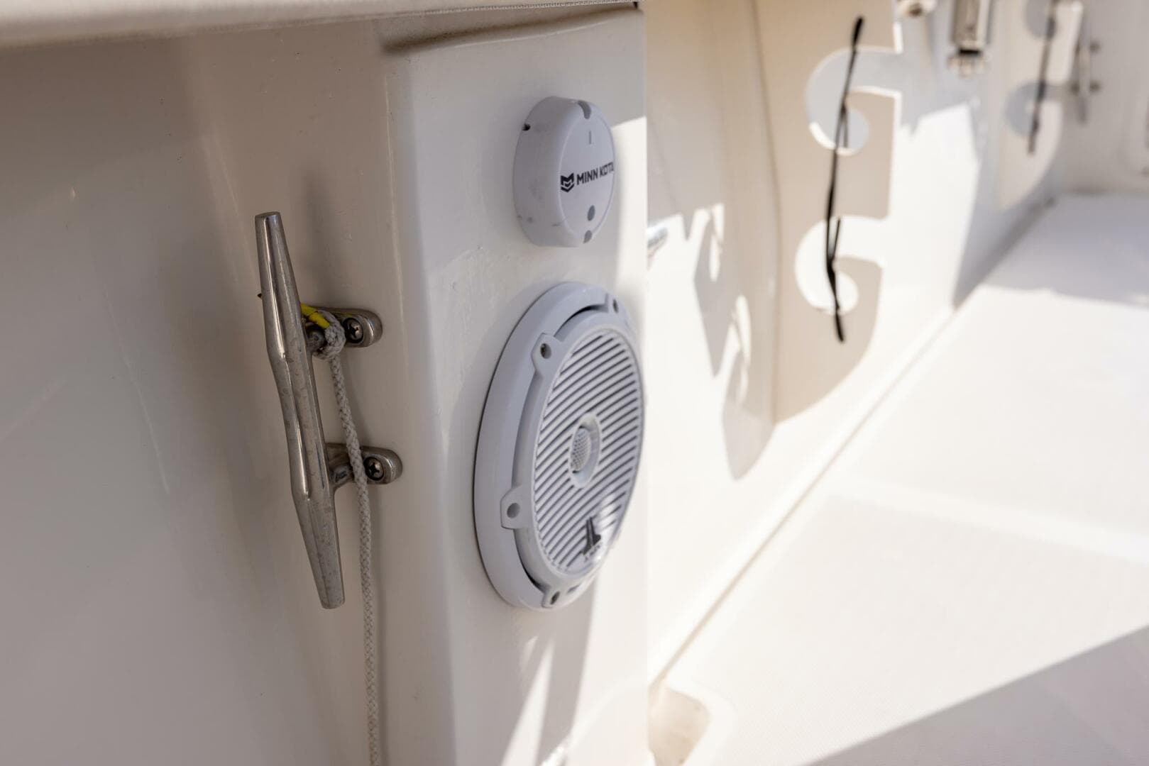 2018 Jupiter 26 FS boat interior with speaker and cleat detail.