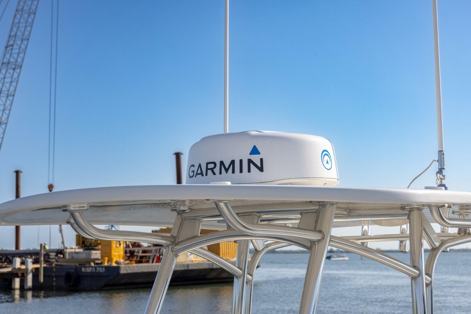 Garmin radar on 2018 Jupiter 26 FS boat, docked by the water.