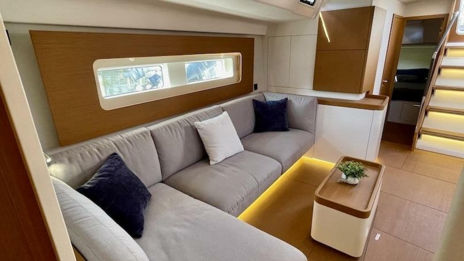 2020 Beneteau First 53 salon settee facing aftward