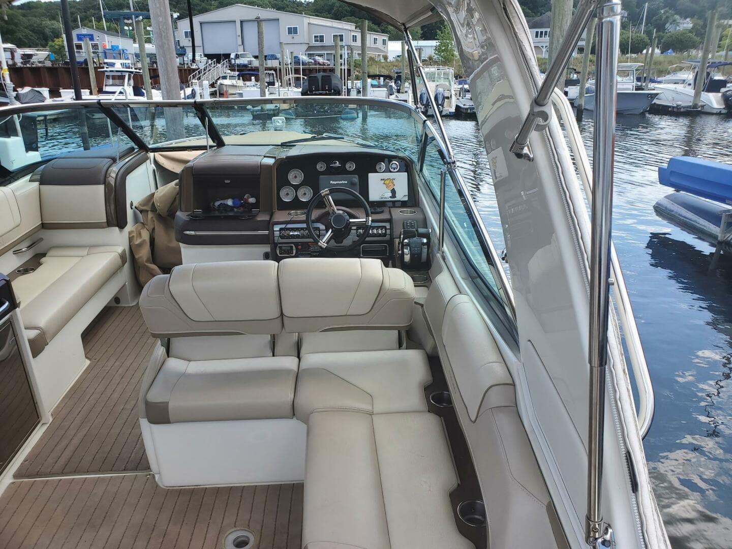 2015 Formula 330 Crossover Bowrider interior with luxurious seating and modern dashboard.