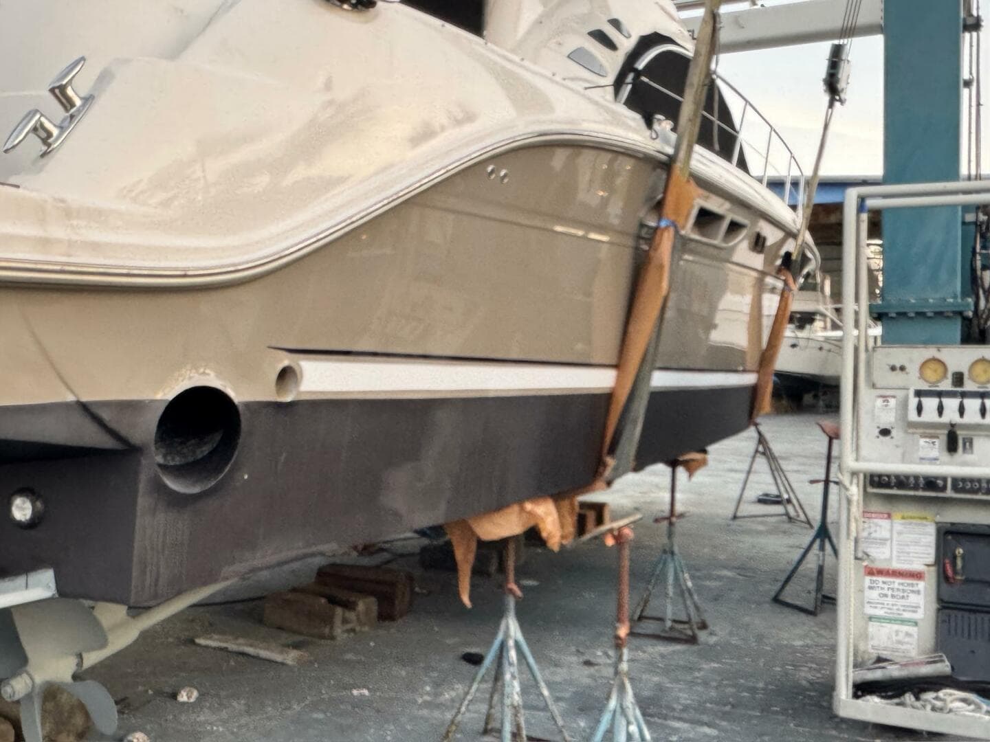 2005 Sea Ray 500 Sedan Bridge yacht in dry dock for maintenance.