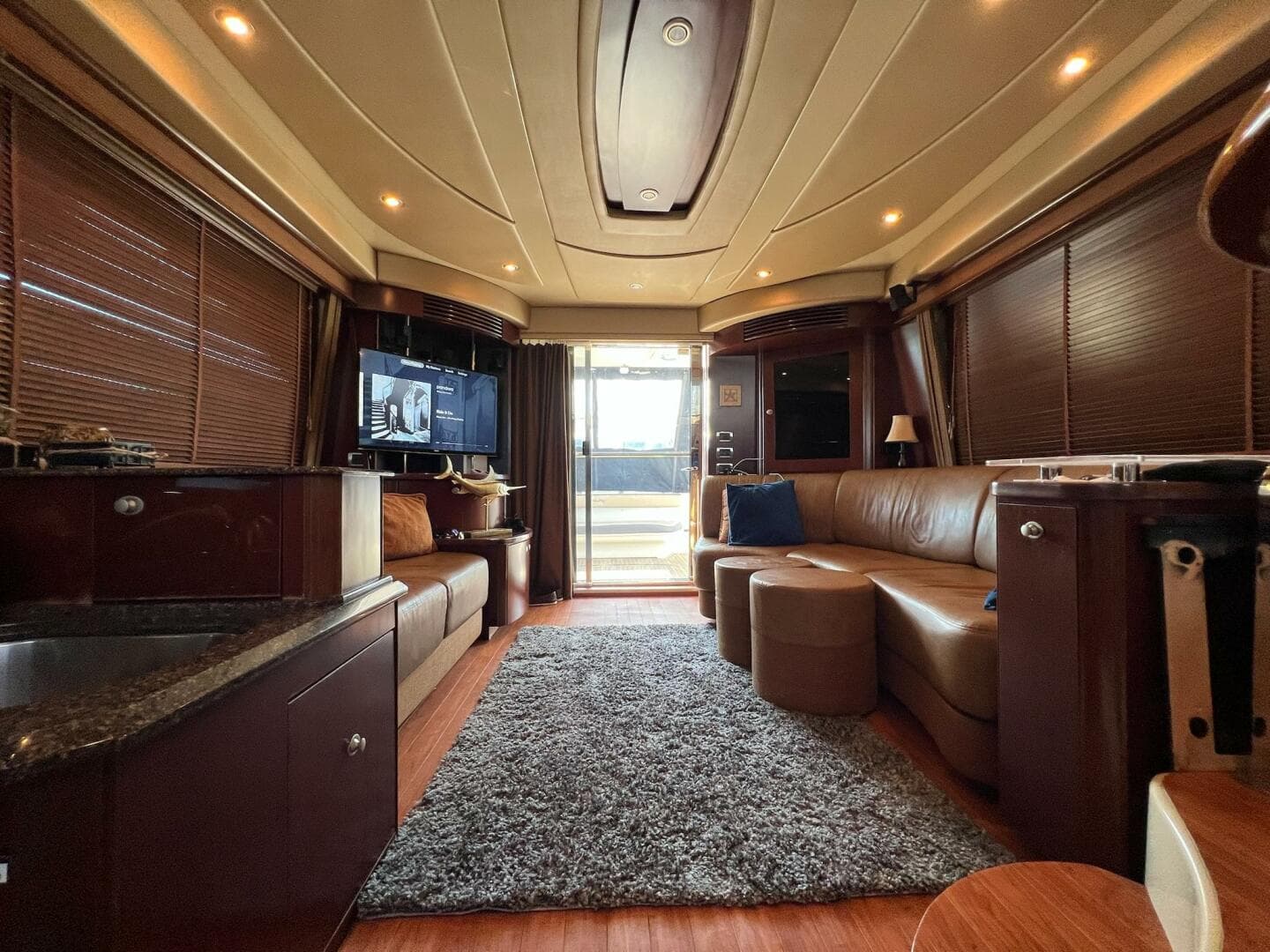 Luxurious interior of a 2005 Sea Ray 500 Sedan Bridge yacht with plush seating and modern amenities.