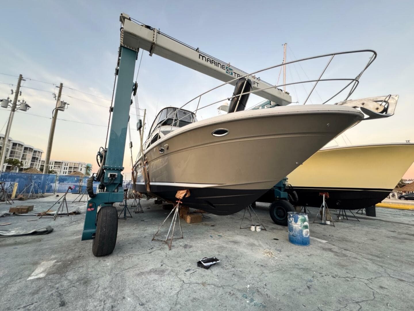 2005 Sea Ray 500 Sedan Bridge yacht on dry dock with crane.