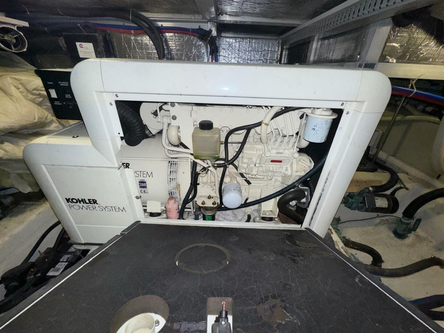 Engine room of 2000 Carver 506 Motor Yacht with Kohler power system.