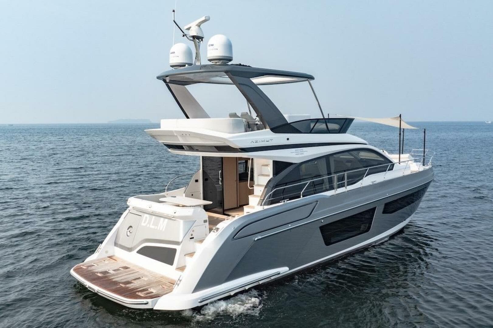 2023 Azimut Fly 53 yacht cruising on open water, showcasing sleek design and luxury features.