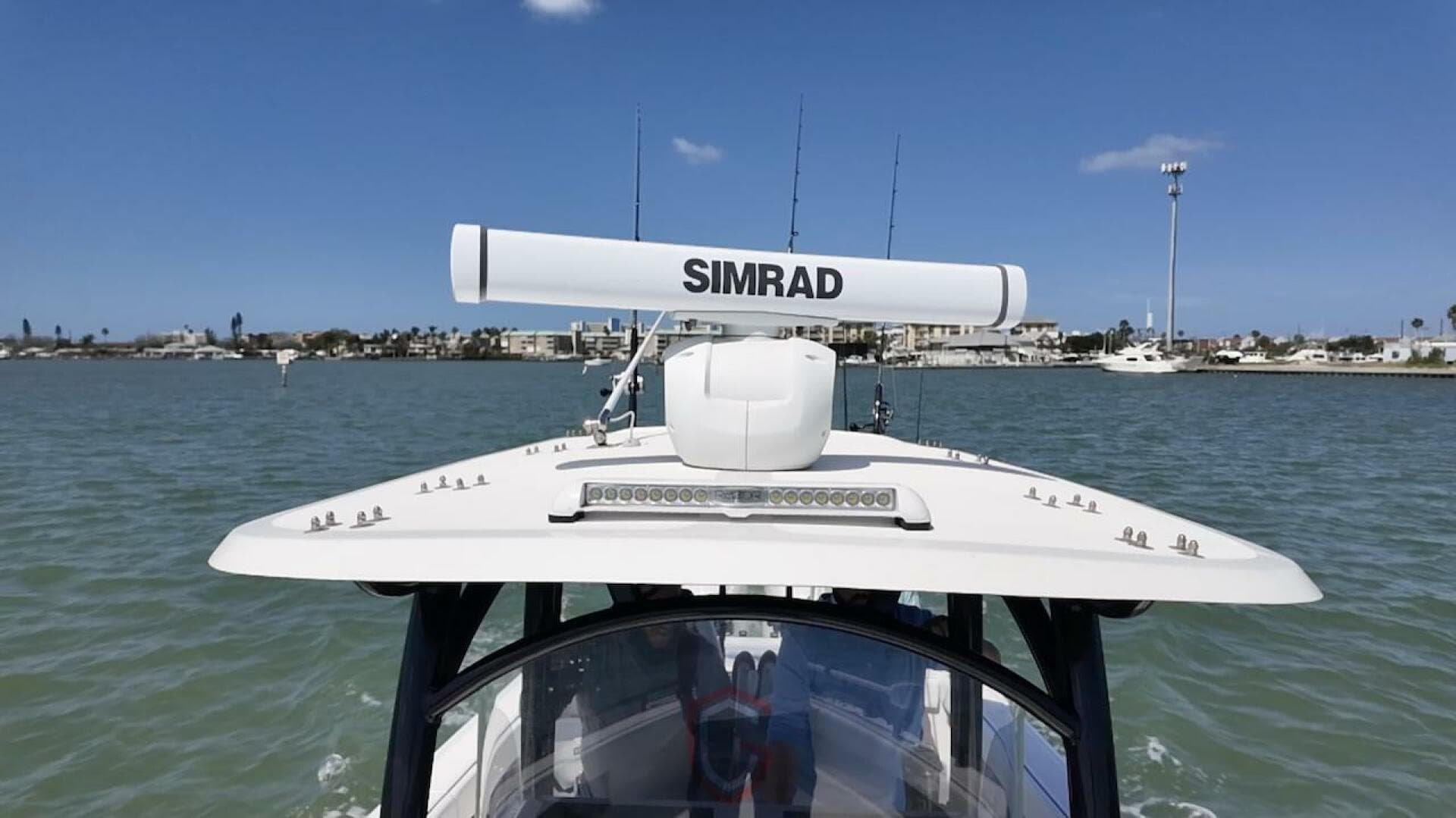 2023 CG Boat Works 35 M-Series on water, featuring Simrad radar system.