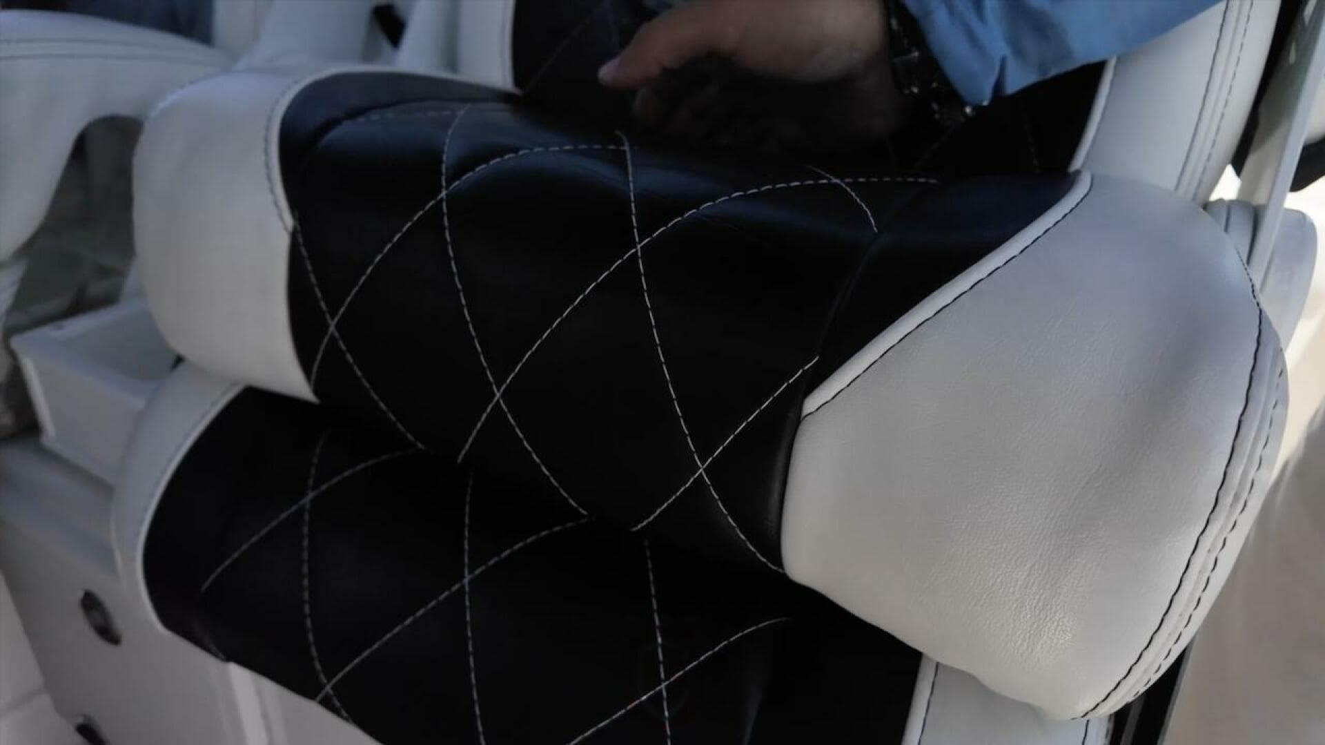 Luxurious black and white leather seating on 2023 CG Boat Works 35 M-Series.