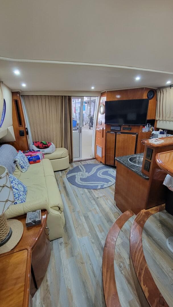 Interior of 2004 Carver 360 Sport Sedan with cozy seating and modern amenities.