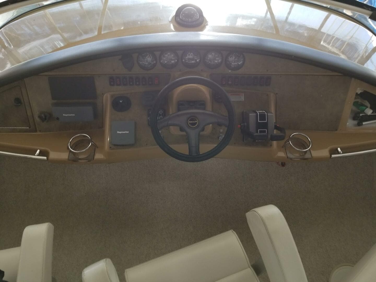 2004 Carver 360 Sport Sedan helm with steering wheel and instrument panel.