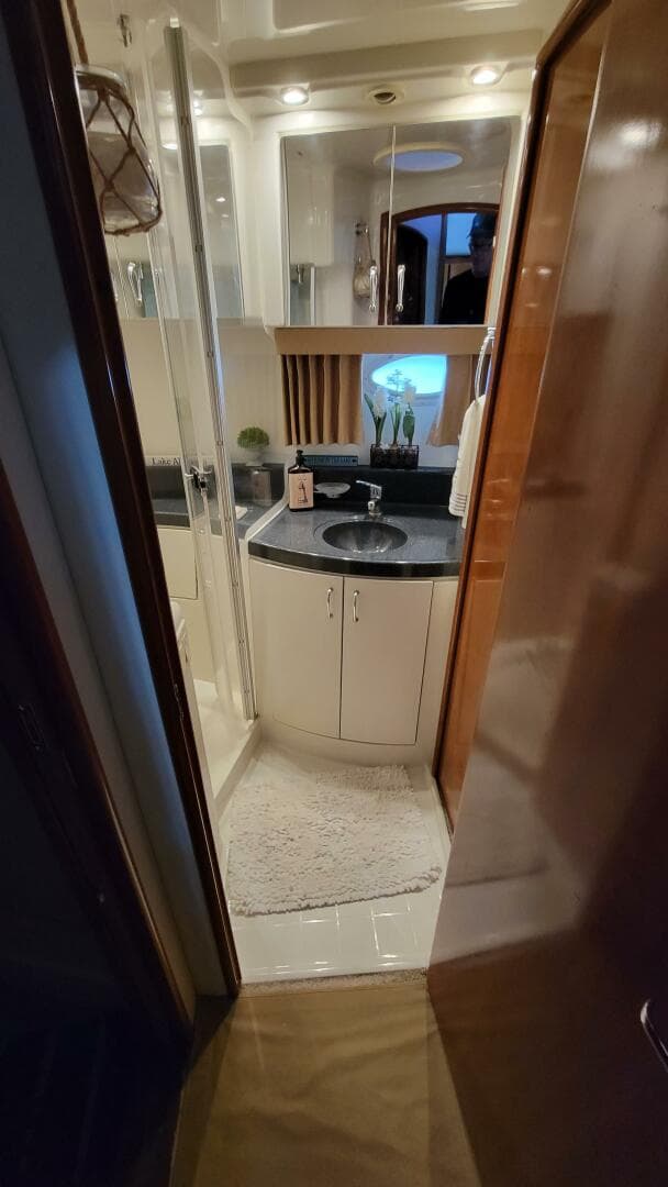 2004 Carver 360 Sport Sedan bathroom with modern fixtures and compact design.