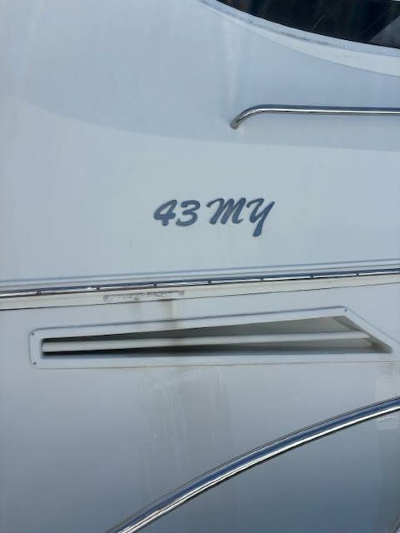 2006 Carver 43 Motor Yacht exterior detail with "43 MY" lettering.