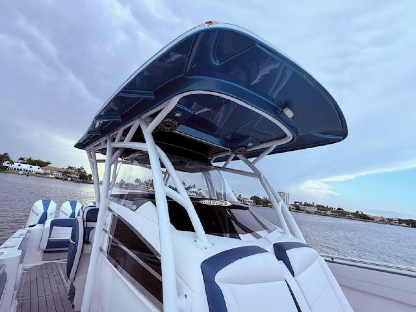 2022 Nor-Tech 390 Sport Center Console boat on water, featuring sleek design and modern amenities.