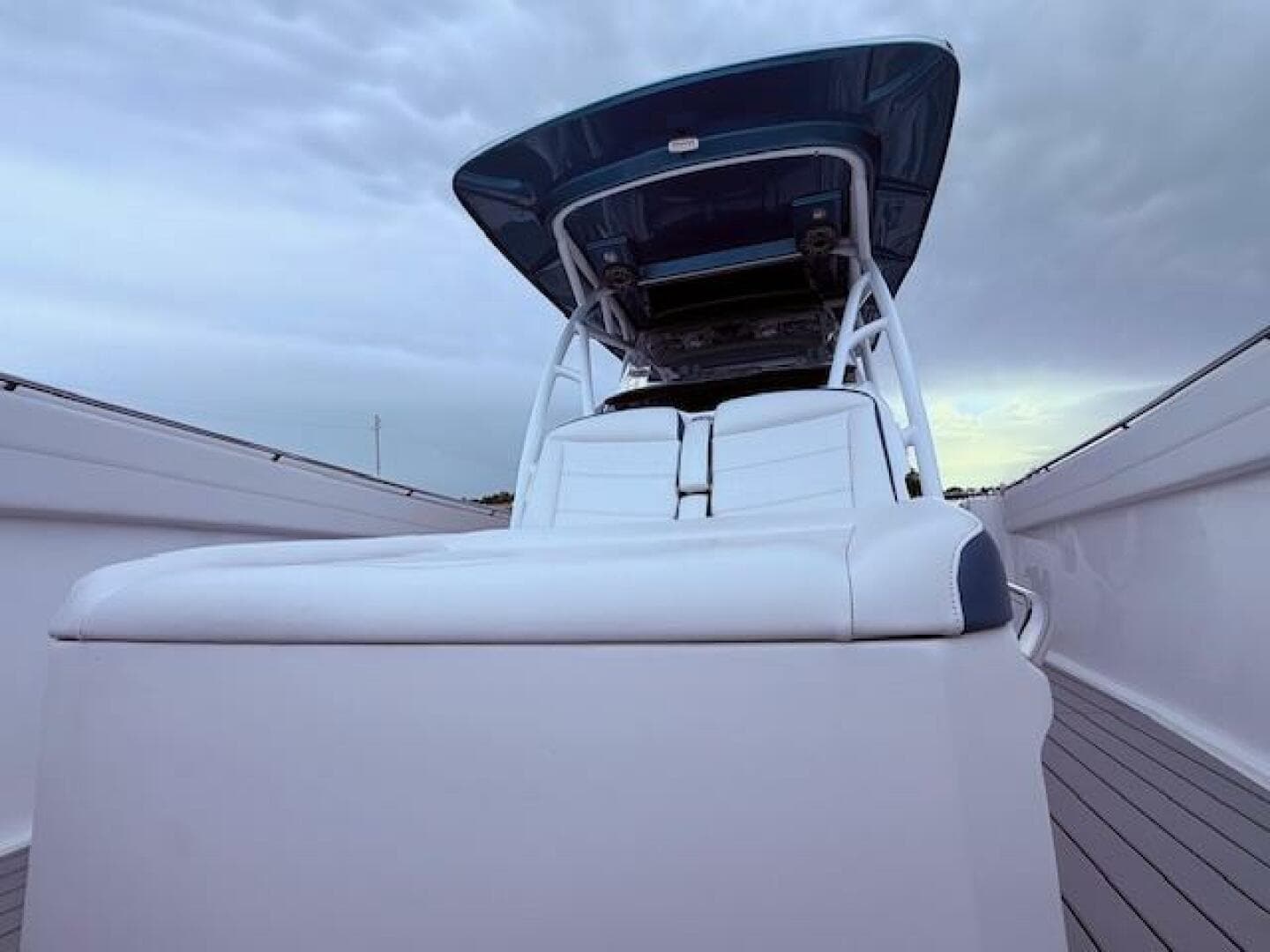2022 Nor-Tech 390 Sport Center Console boat with sleek seating and modern design.