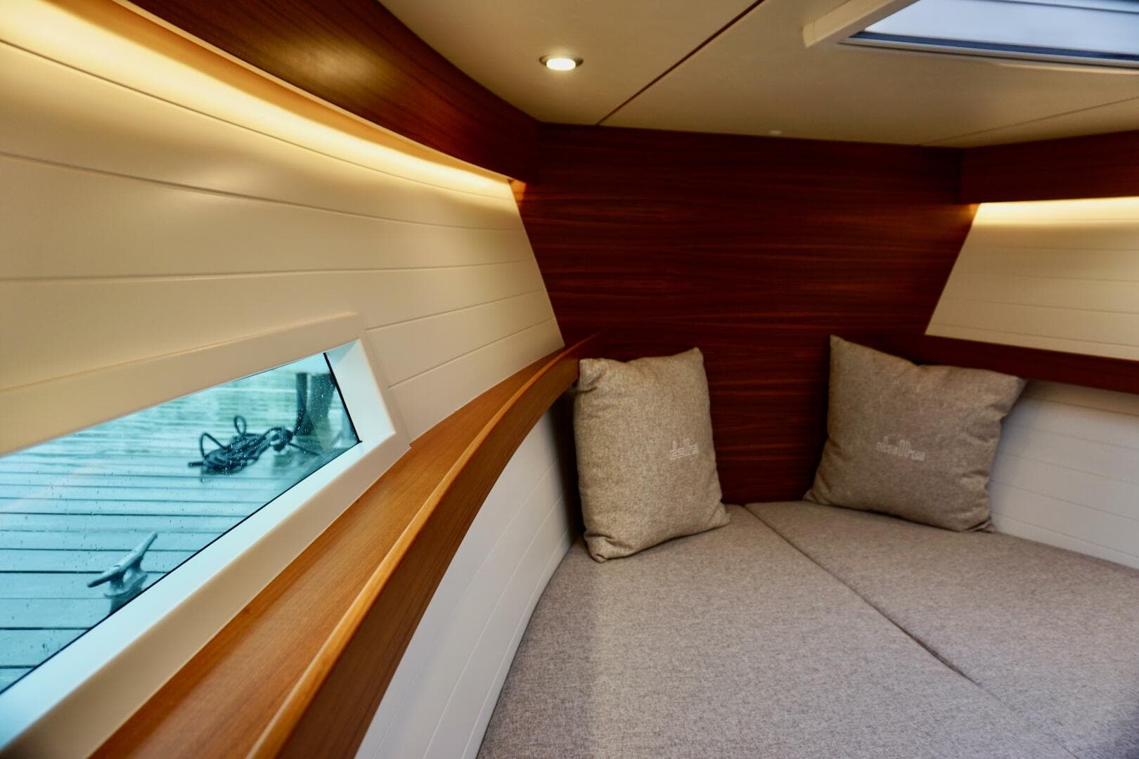 2023 Delta Powerboats 33 Coupe London Calling v berth port window