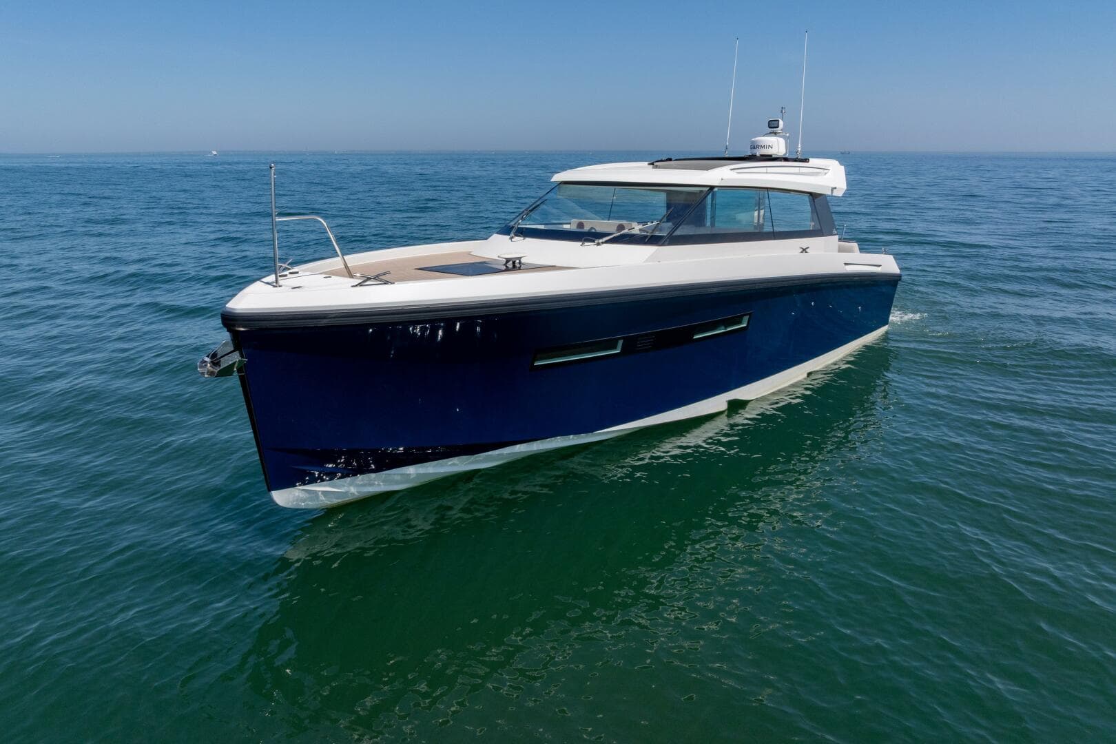 2023 Delta Powerboats 33 Coupe London Calling portside forward quarter drone