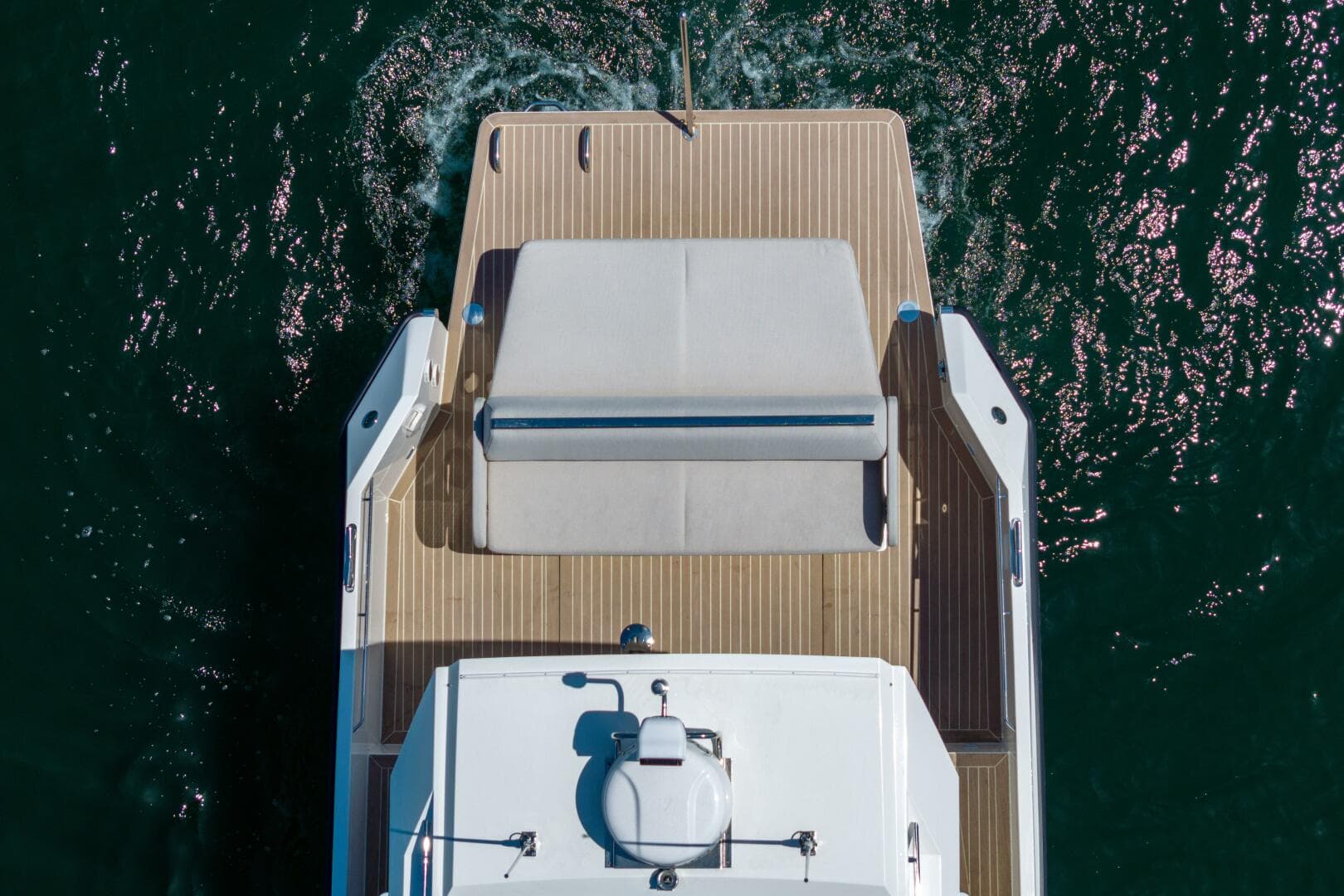 2023 Delta Powerboats 33 Coupe London Calling aft sunpad