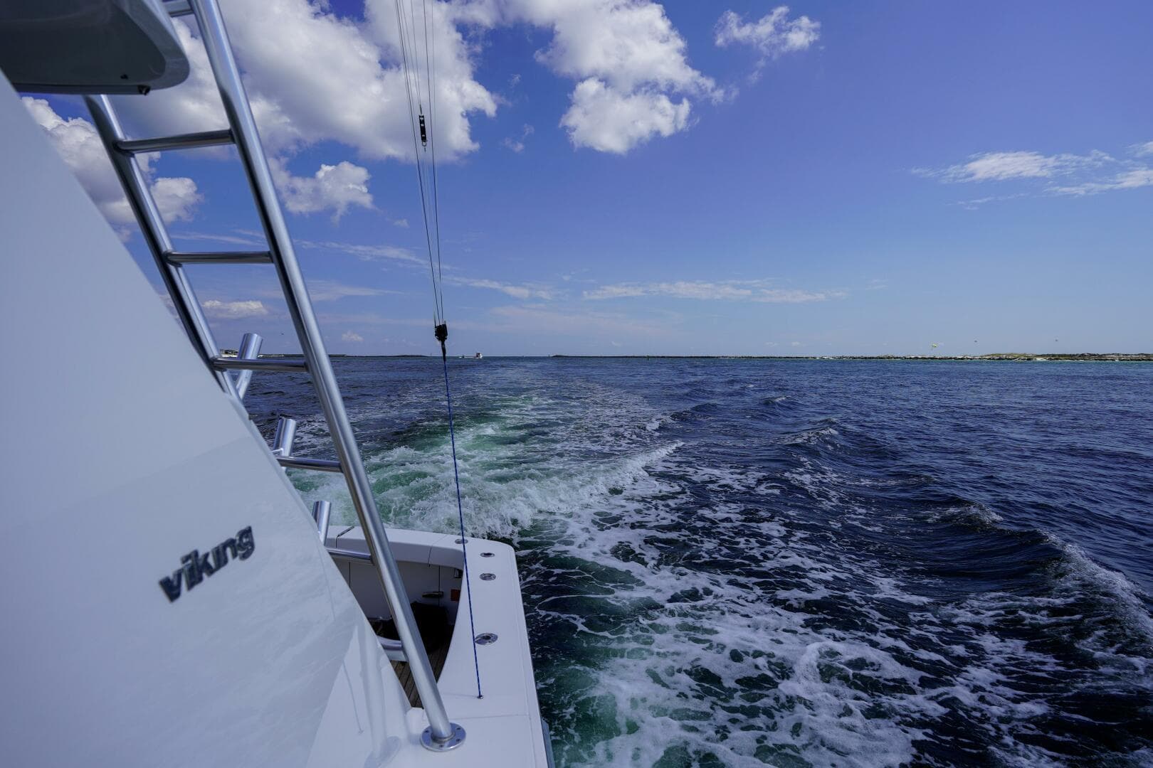 2016 Viking 52 Sport Tower- CONTAGIOUS HABIT- Badge