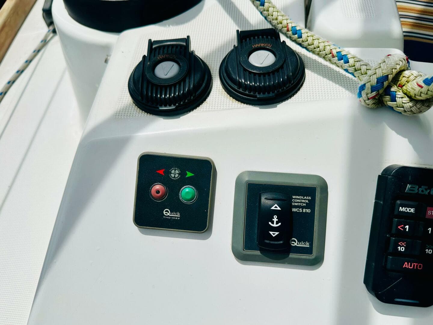 Control panel on a 2015 Beneteau Oceanis 45 sailboat, featuring winch and windlass switches.