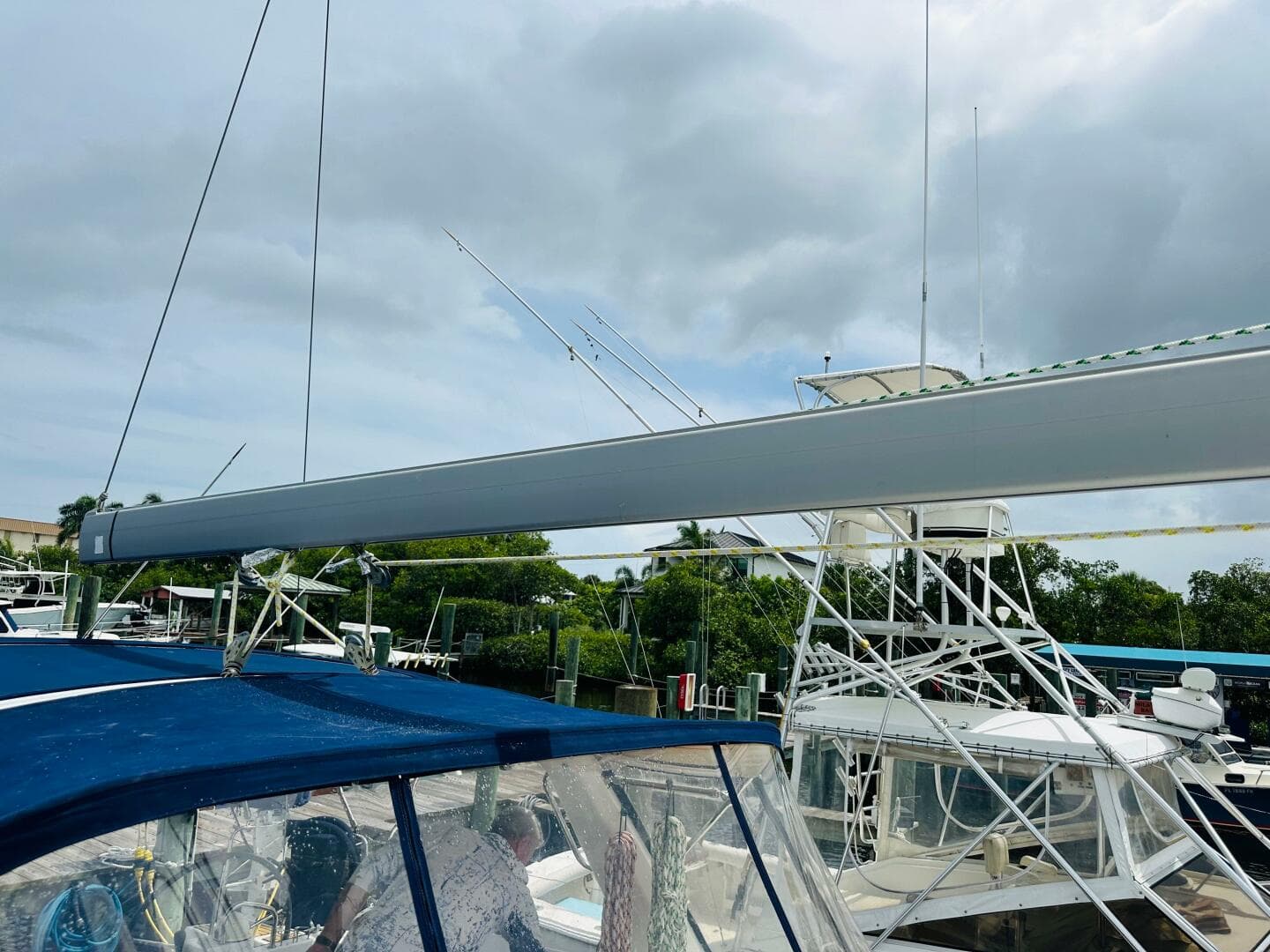Beneteau Oceanis 45 sailboat, 2015 model, docked with visible rigging and canopy.