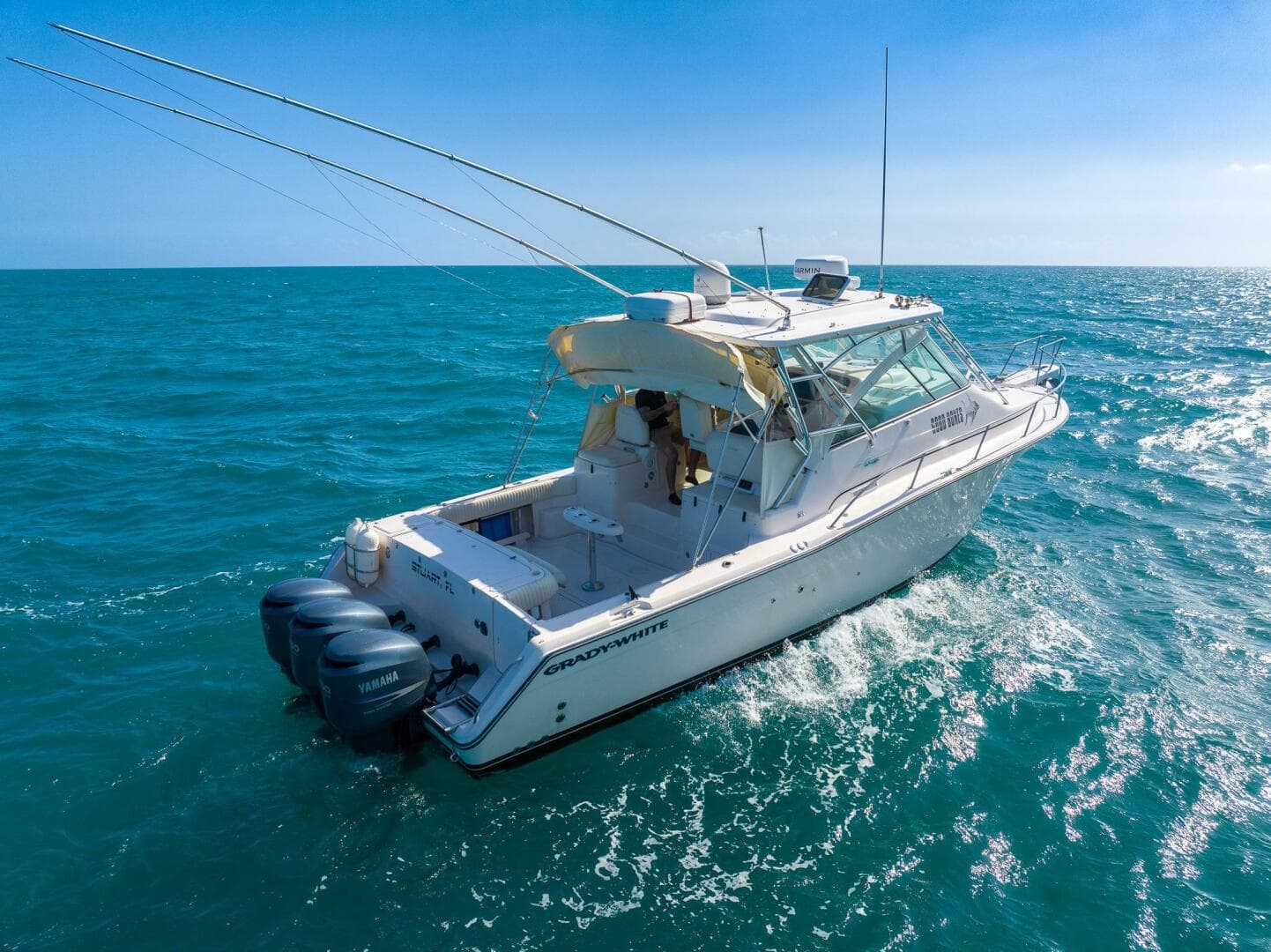 2007 Grady-White Express 360 boat cruising on open blue sea.